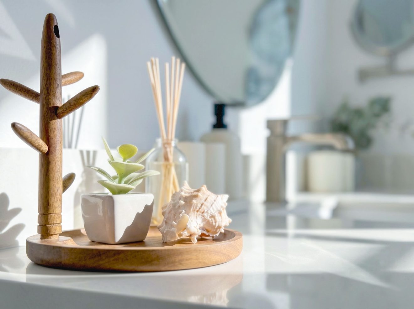 Bathroom vanity styled with coastal decor